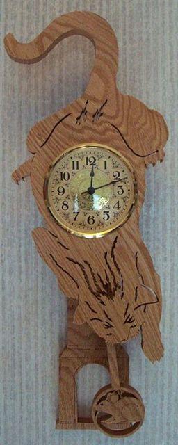 Buternut pendulum clock; Pattern from [url=http://www.scrollerltd.com/]Scroller Ltd.[/url]